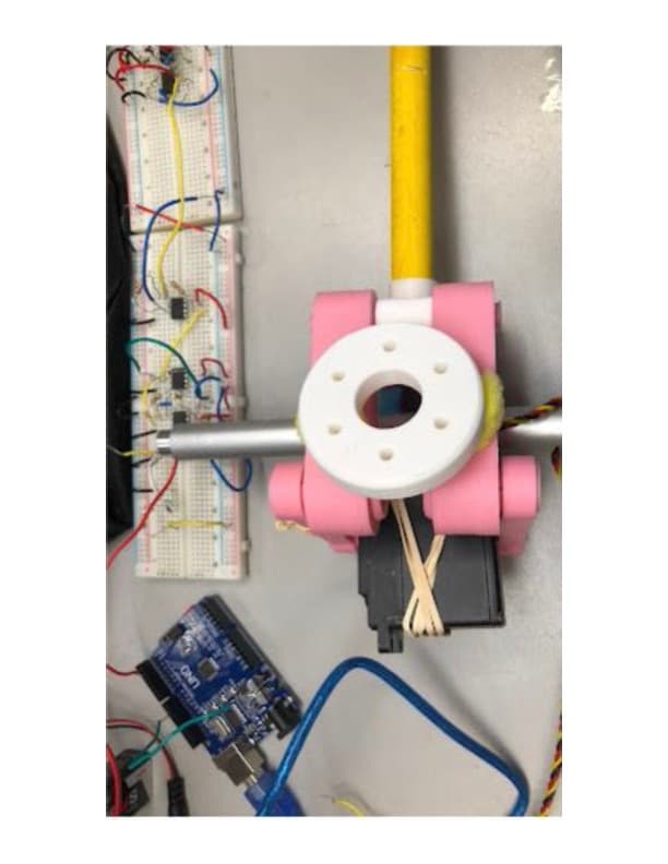 EMG-controlled prosthetic arm prototype with Arduino, servo motor, and 3D-printed components